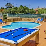 By Villa *